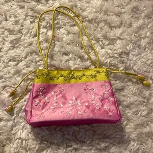Adorable handmade bag.  Beautiful embroidered details and accents.